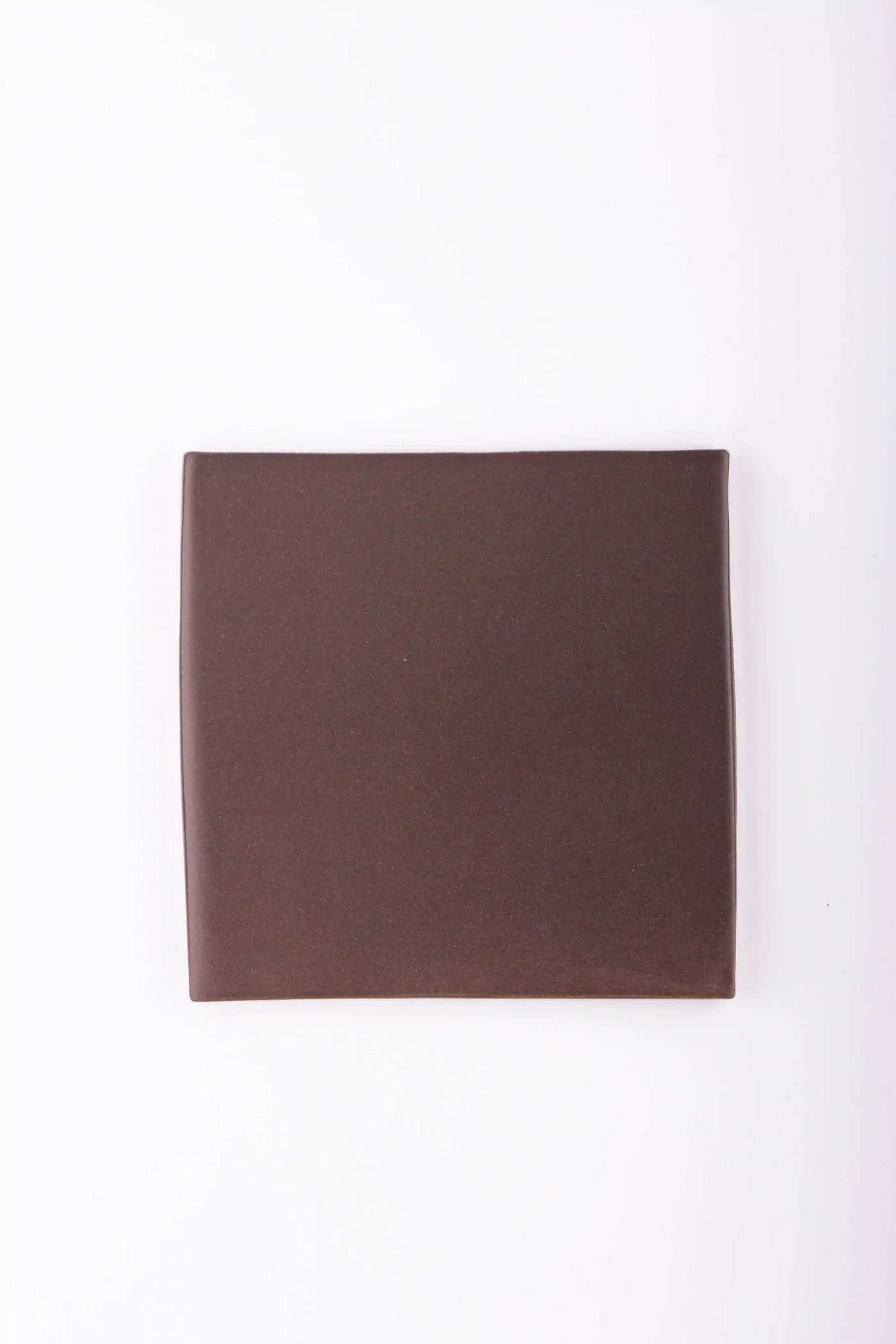 Brown mat handmade tile