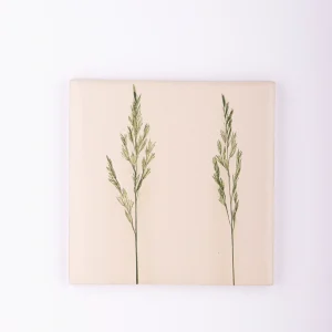 handmade tiles with green flower