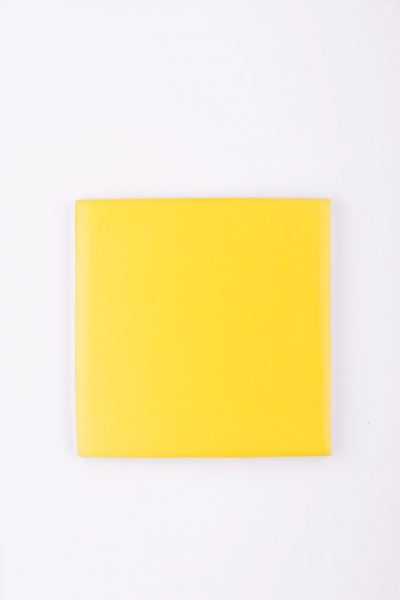 Yellow mat handmade tile
