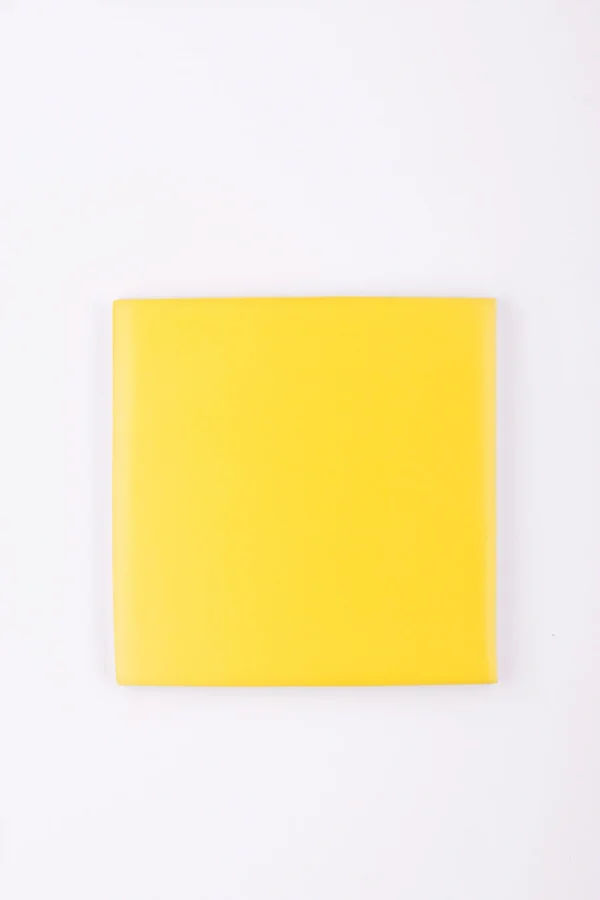 Yellow mat handmade tile