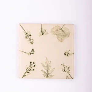handmade tiles with green flowers