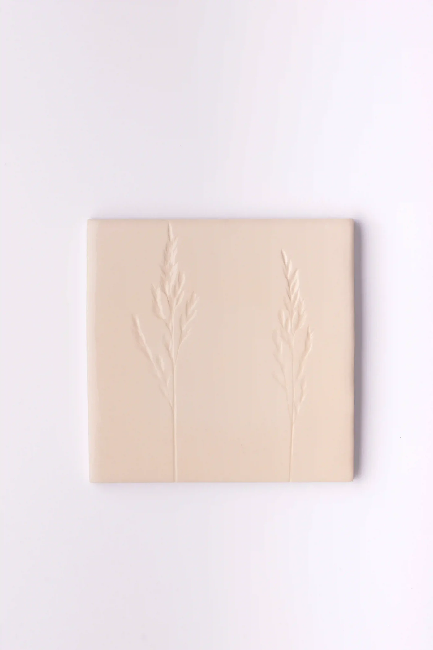 handmade wall tile with grasses
